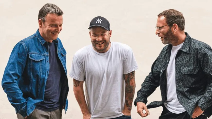 The three founders of Symplicity Foods, laughing together