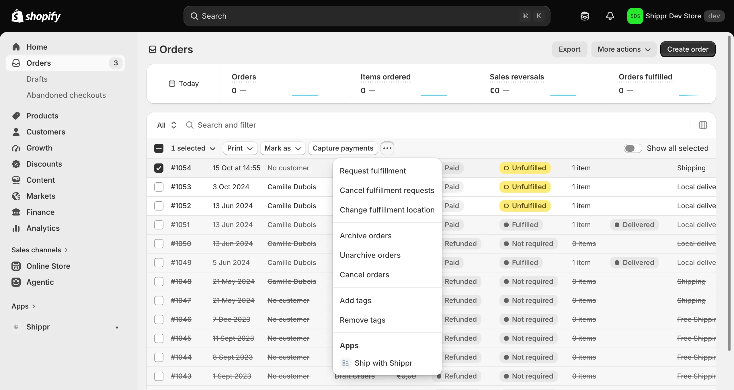 The Shopify order list, with the actions menu open on “Ship with Shippr”.